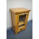 A MODERN SOLID OAK MEDIA CABINET, width 66cm x depth 47cm x height 107cm (condition - stain to top)