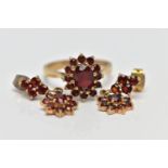 A 9CT GOLD GARNET RING AND EARRINGS, a cluster ring designed as an oval cut garnet, set with