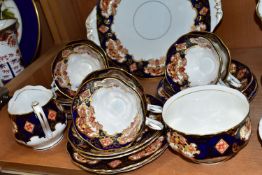 A ROYAL ALBERT 'HEIRLOOM' PATTERN TWENTY PIECE TEA SERVICE, comprising six cups, five saucers, six