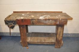 A WOODEN WORKBENCH with Record 52 1/2 bench vice with quick release and undershelf