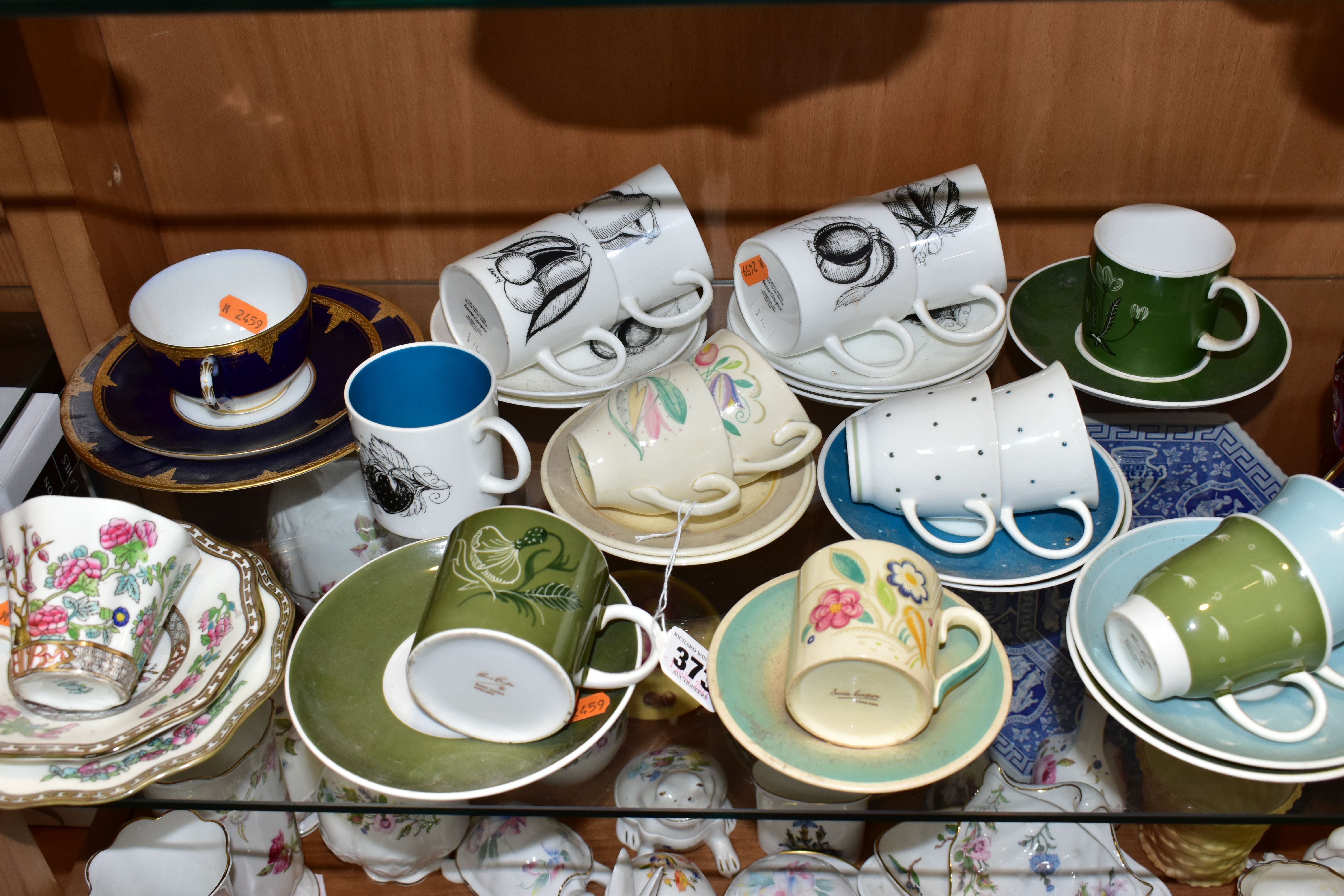 A COLLECTION OF SUSIE COOPER DESIGN COFFEE CUPS AND SAUCERS AND TWO OTHER TRIOS, the Susie Cooper to