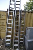 TWO ALUMINIUM SINGLE EXTENSION LADDERS, and a wooden extension ladder with aluminium steps (3)