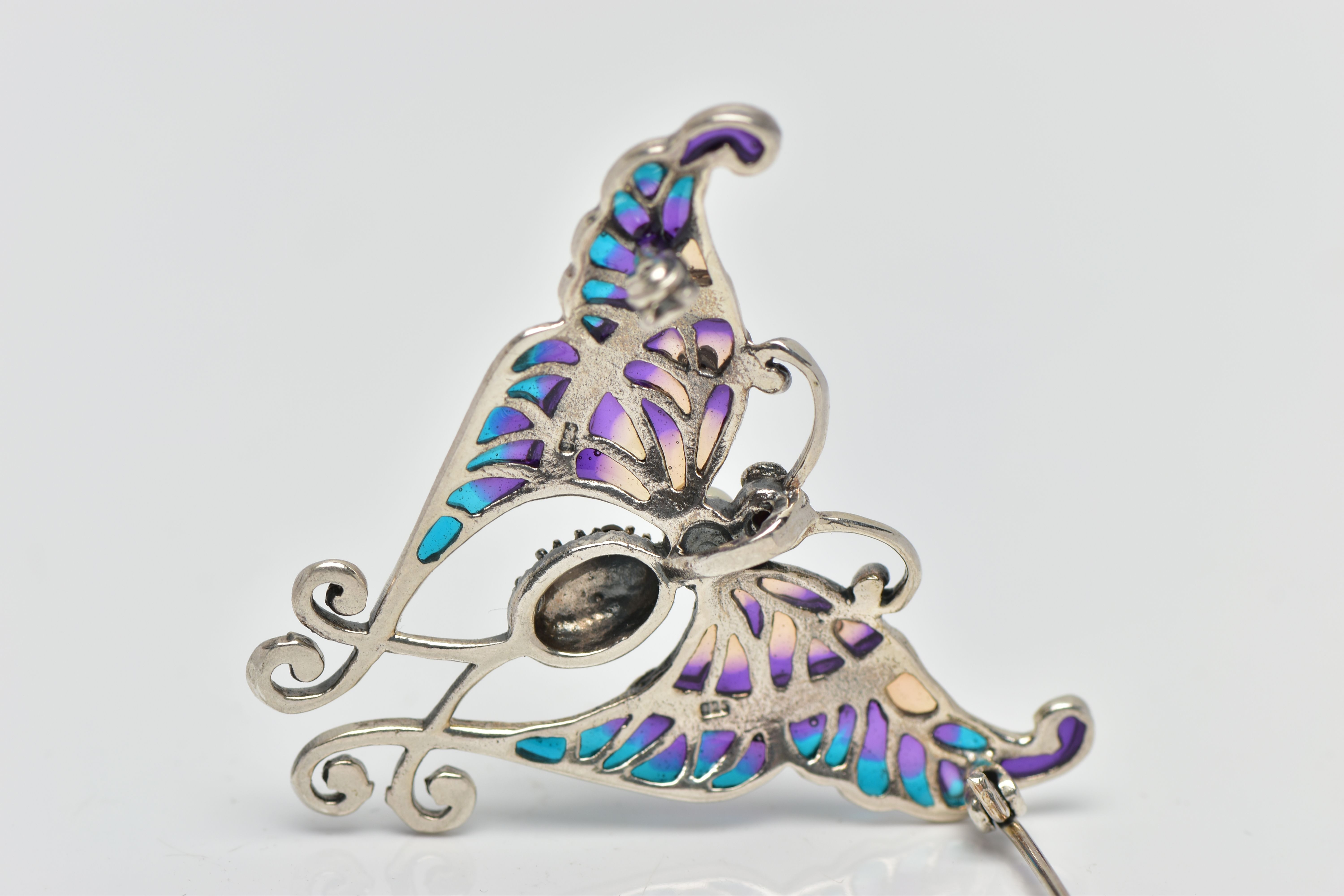 A PLIQUE A JOUR BUTTERFLY BROOCH, the marcasite and cultured pearl body, to the circular ruby - Image 3 of 3