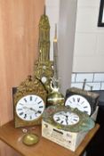 THREE LATE 19TH CENTURY FRENCH COMPTOISE WALL CLOCKS, one with embossed figures to the brass