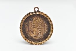 A QUEEN VICTORIA GOLD WASHED SHILLING AND PENDANT, the silver coin dated 1887, fitted inside a