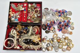 AN ASSORTMENT OF COSTUME JEWELLERY, to include a selection of white metal and marcasite brooches,