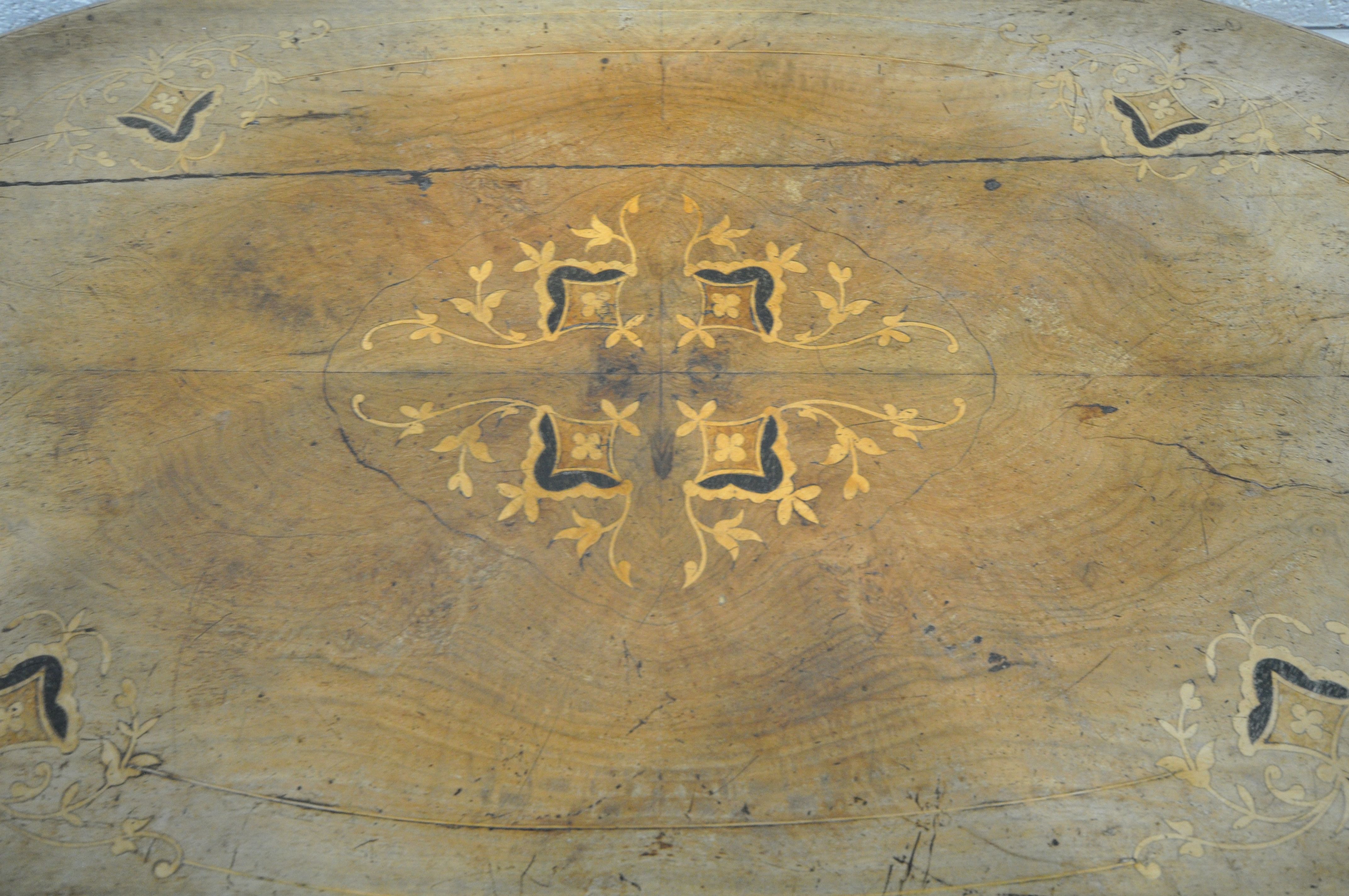 A VICTORIAN OVAL WALNUT CENTRE TABLE, with floral marquetry inlay, with turned supports, on carved - Image 3 of 6