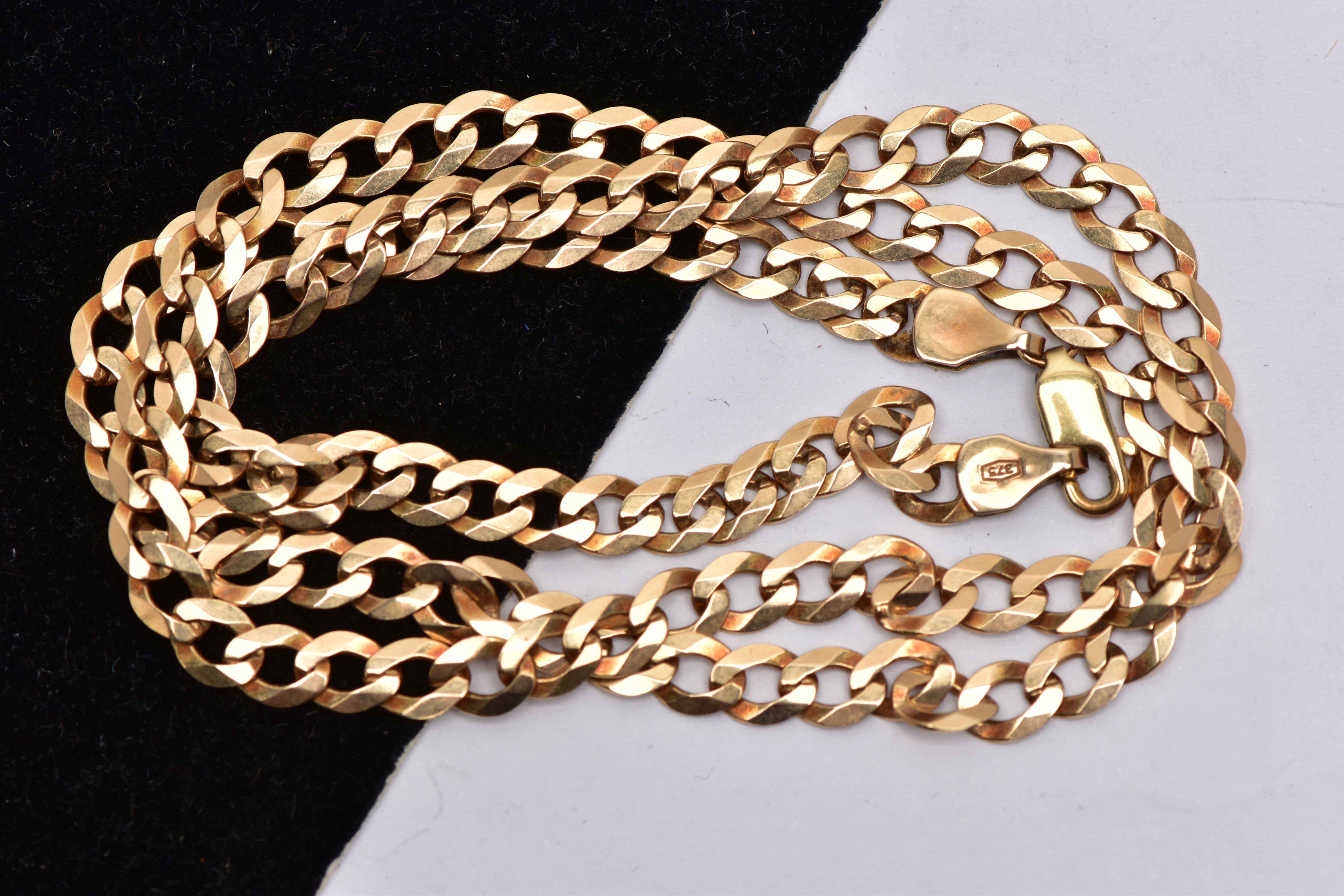 A 9CT GOLD NECKLACE, designed as a flat curb link chain with lobster clasp, approximate length