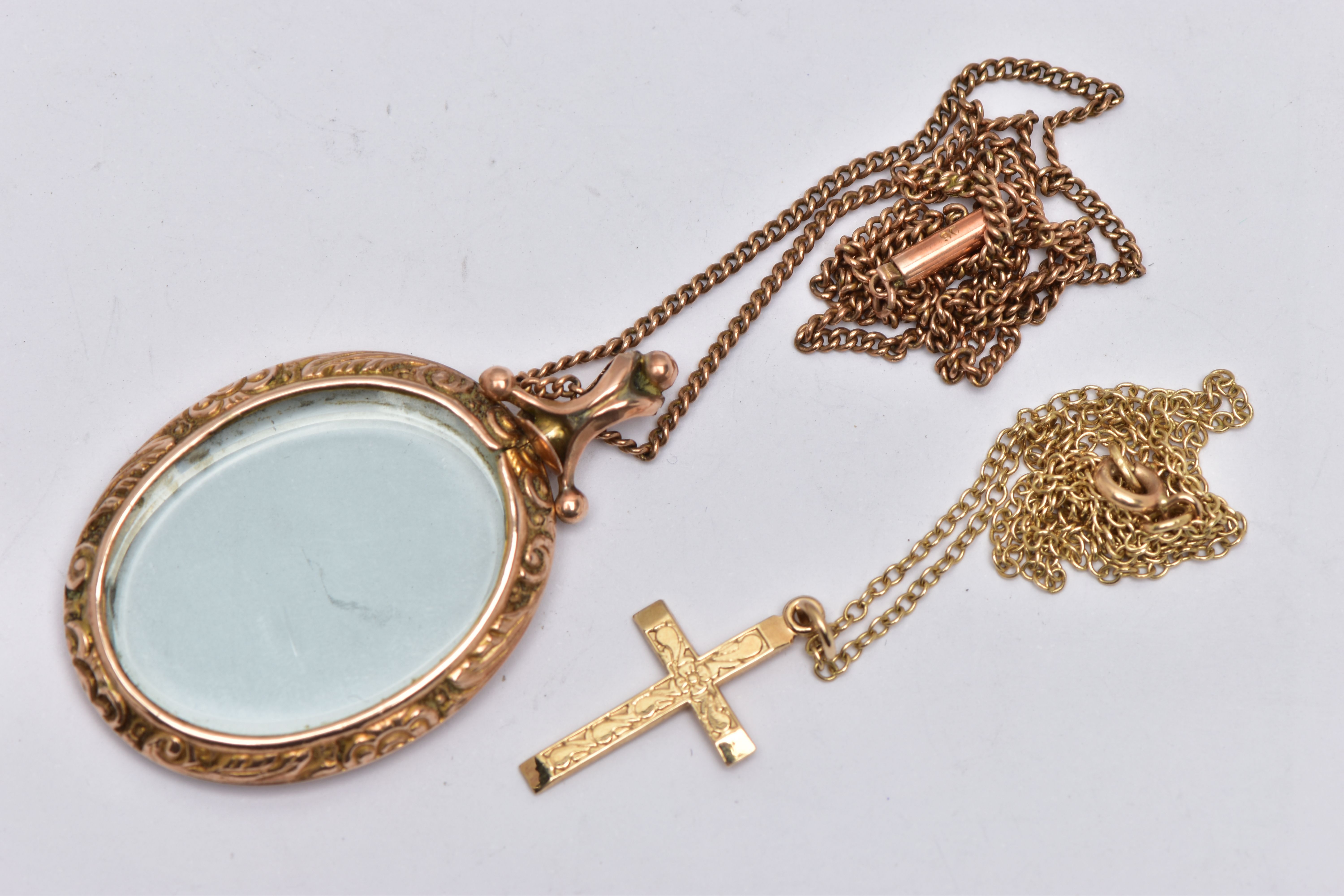 AN EARLY 20TH CENTURY 9CT GOLD PENDANT WITH 9CT GOLD CHAIN, A 9CT GOLD CROSS PENDANT WITH 9CT GOLD