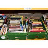BOOKS, four boxes containing approximately 115 titles in hardback and paperback format, subject