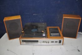 A CARLTONE 7000 MUSIC CENTRE with radio/cassette and record player along with two unbranded speakers