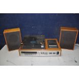 A CARLTONE 7000 MUSIC CENTRE with radio/cassette and record player along with two unbranded speakers