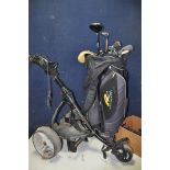 A POWERCADDY GOLF CART AND GOLF BAG containing clubs of various different brand names such as