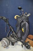 A POWERCADDY GOLF CART AND GOLF BAG containing clubs of various different brand names such as