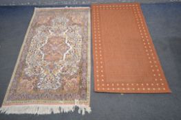 A 20TH CENTURY SILK EFFECT KASHAN PINK RUG, 154cm x 94cm, and another rug (2)