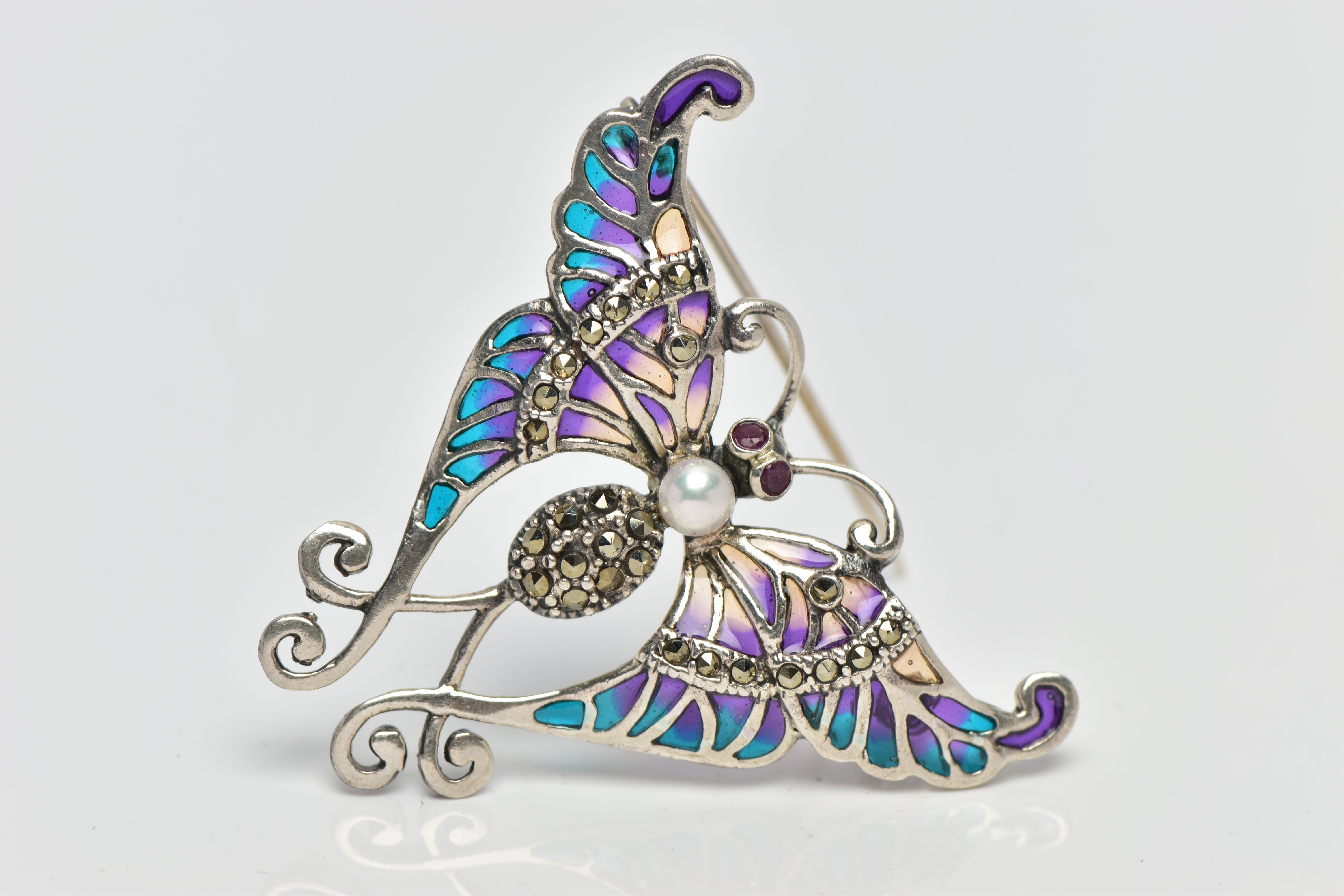 A PLIQUE A JOUR BUTTERFLY BROOCH, the marcasite and cultured pearl body, to the circular ruby