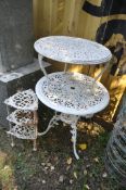 A WHITE PAINTED ALUMINIUM CIRCULAR GARDEN TABLE, diameter 69cm x height 70cm, a similar occasional