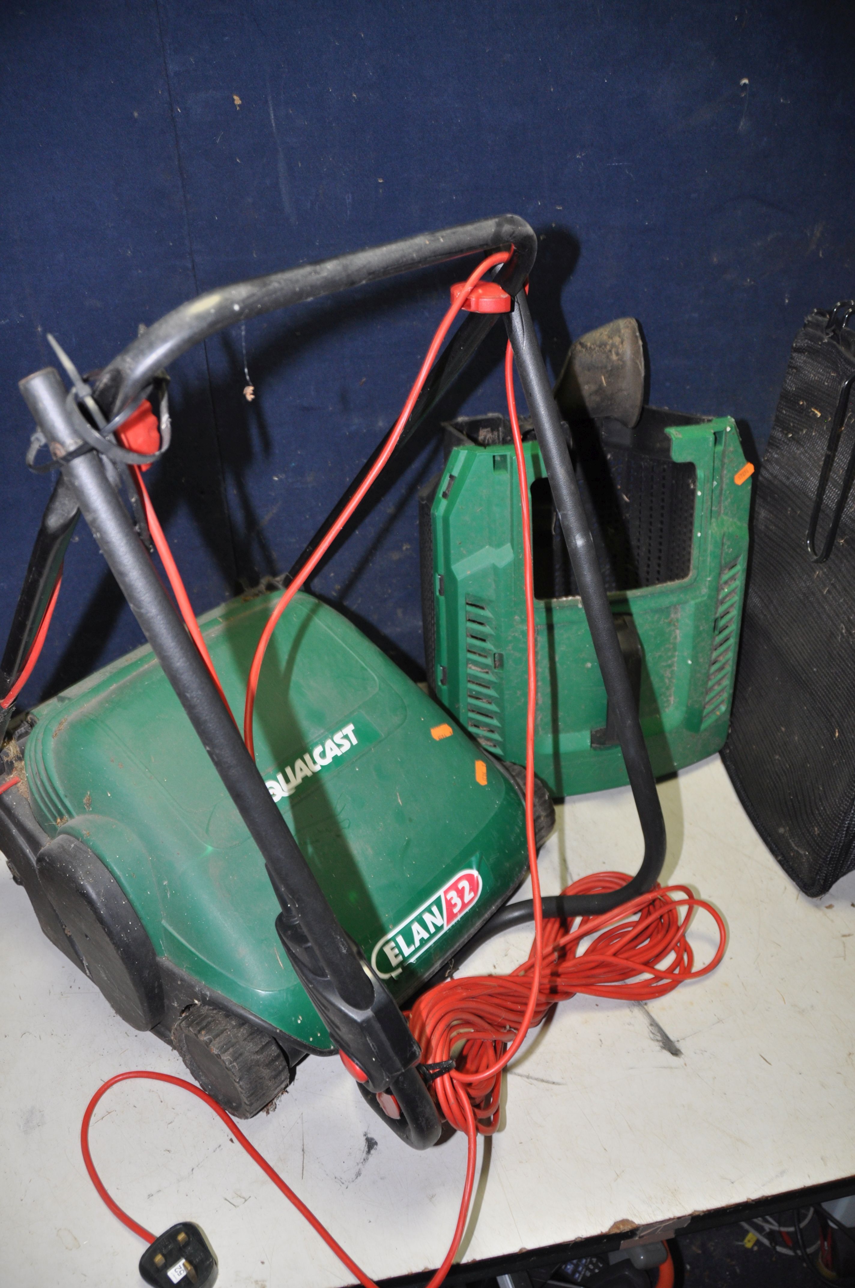 A QUALCAST GLR750 ELECTRIC LAWN RAKE with grass box, along with a Qualcast ELAN32 lawn mower with - Image 2 of 3