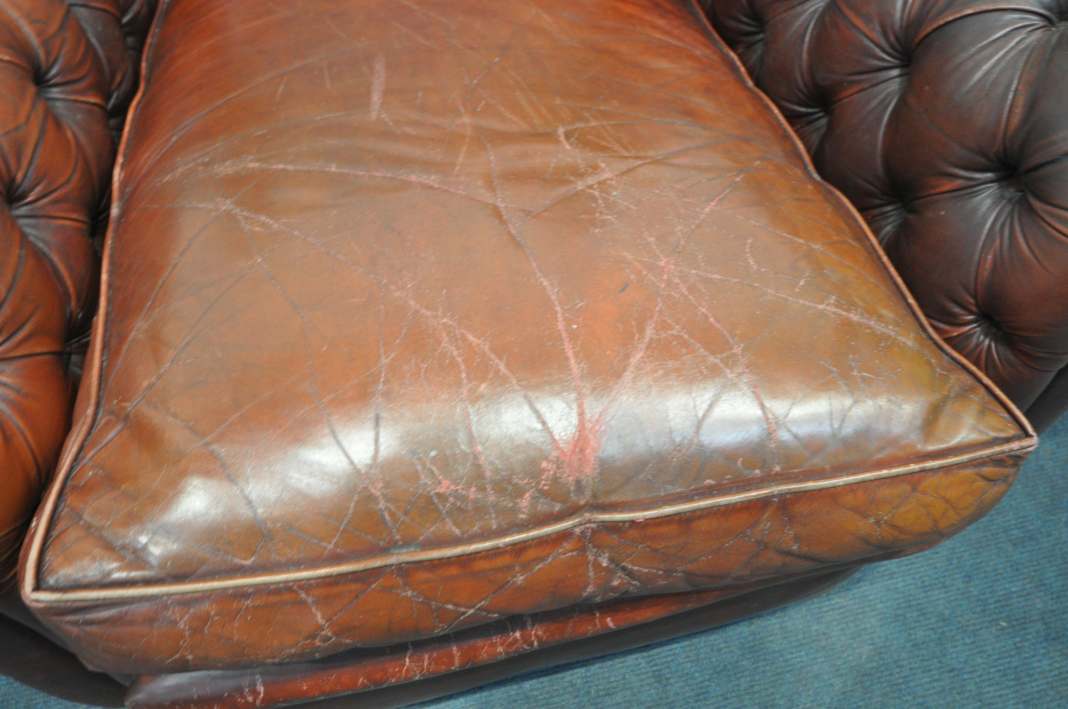 A BUTTONED OXBLOOD LEATHER ARMCHAIR, width 100cm x depth 106cm x height 104cm (condition:-torn - Image 4 of 5