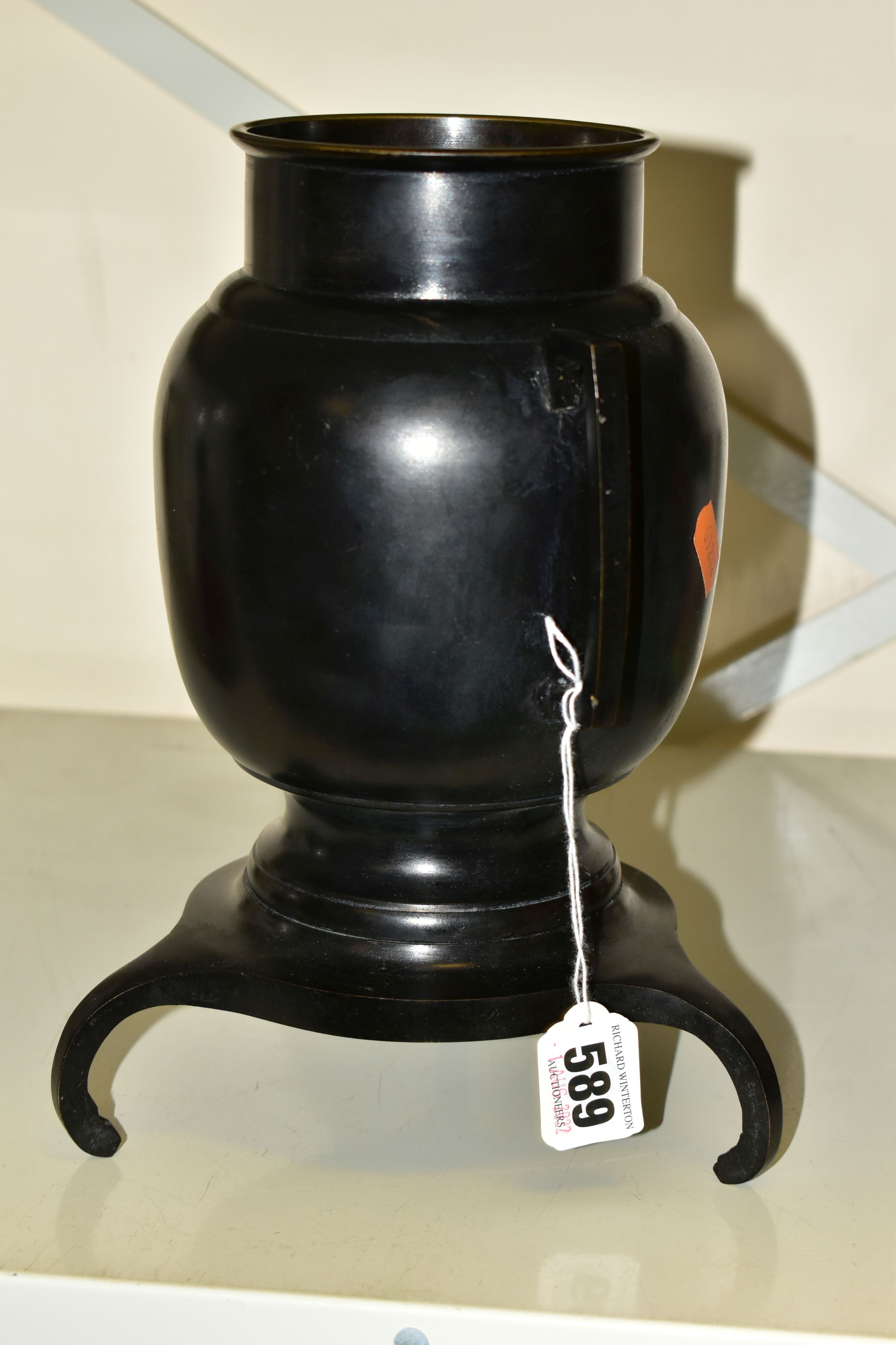A BRONZED JAPANESE STYLE VASE, of bulbous form with geometric handles, supported on its base by - Image 2 of 5