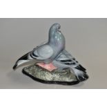 A CARLTON WARE FIGURE GROUP OF TWO PIGEONS, modelled as standing on a rocky base, printed marks