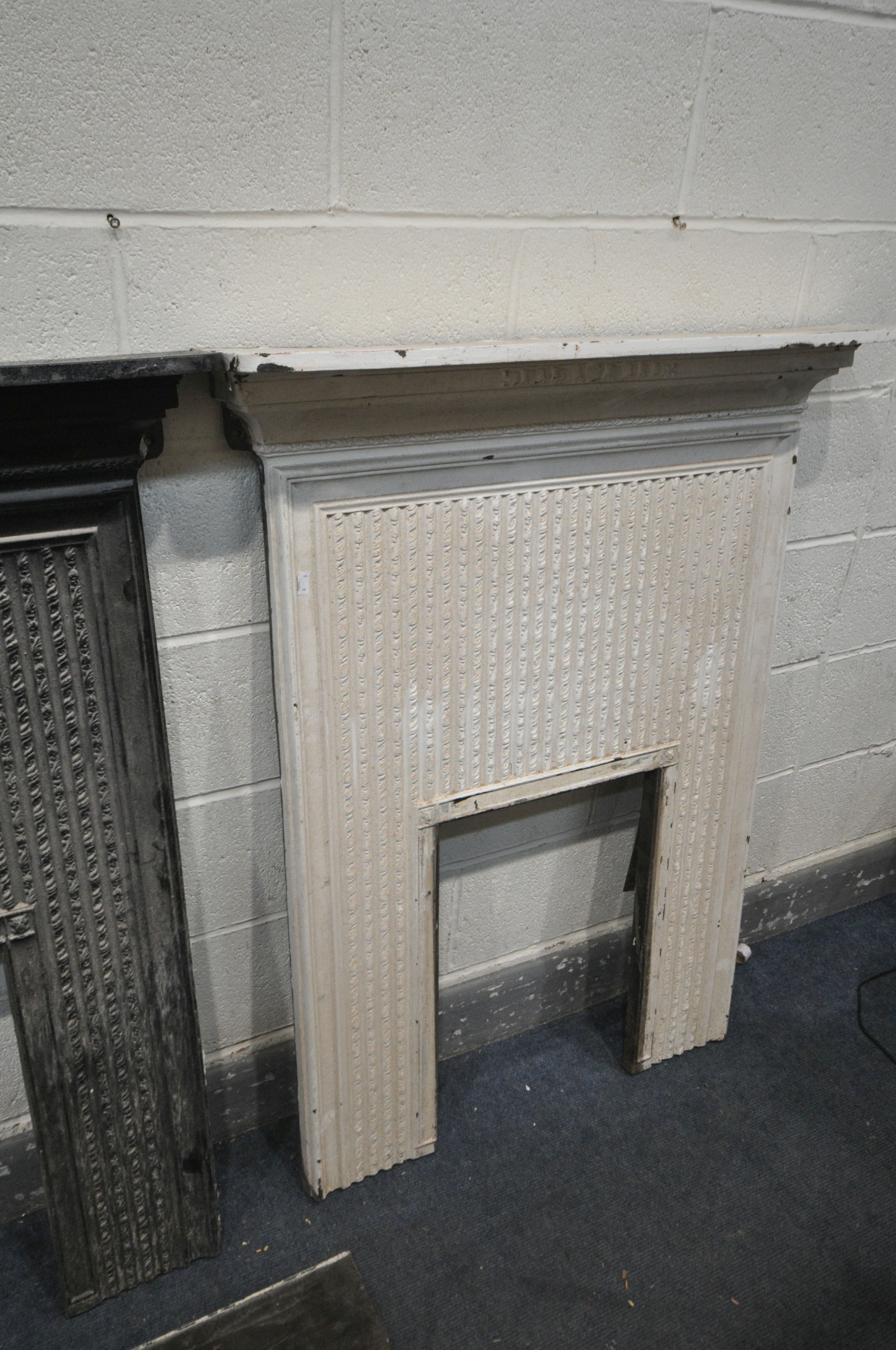 THREE CAST IRON FIRE SURROUNDS, two painted black, one painted white, width 91cm x depth 17cm x - Image 2 of 4