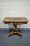 A VICTORIAN ROSEWOOD TEA TABLE, the fold over top, over octagonal bulbous support, quadform base,