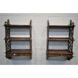 A PAIR OF HARDWOOD WALL MOUNTED SHELVES, with two drawers, width 54cm x depth 20cm x height 91cm (