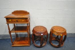 A PAIR OF 20TH CENTURY HARDWOOD OPIUM BARREL STOOLS, with pierced supports, diameter 40cm x height