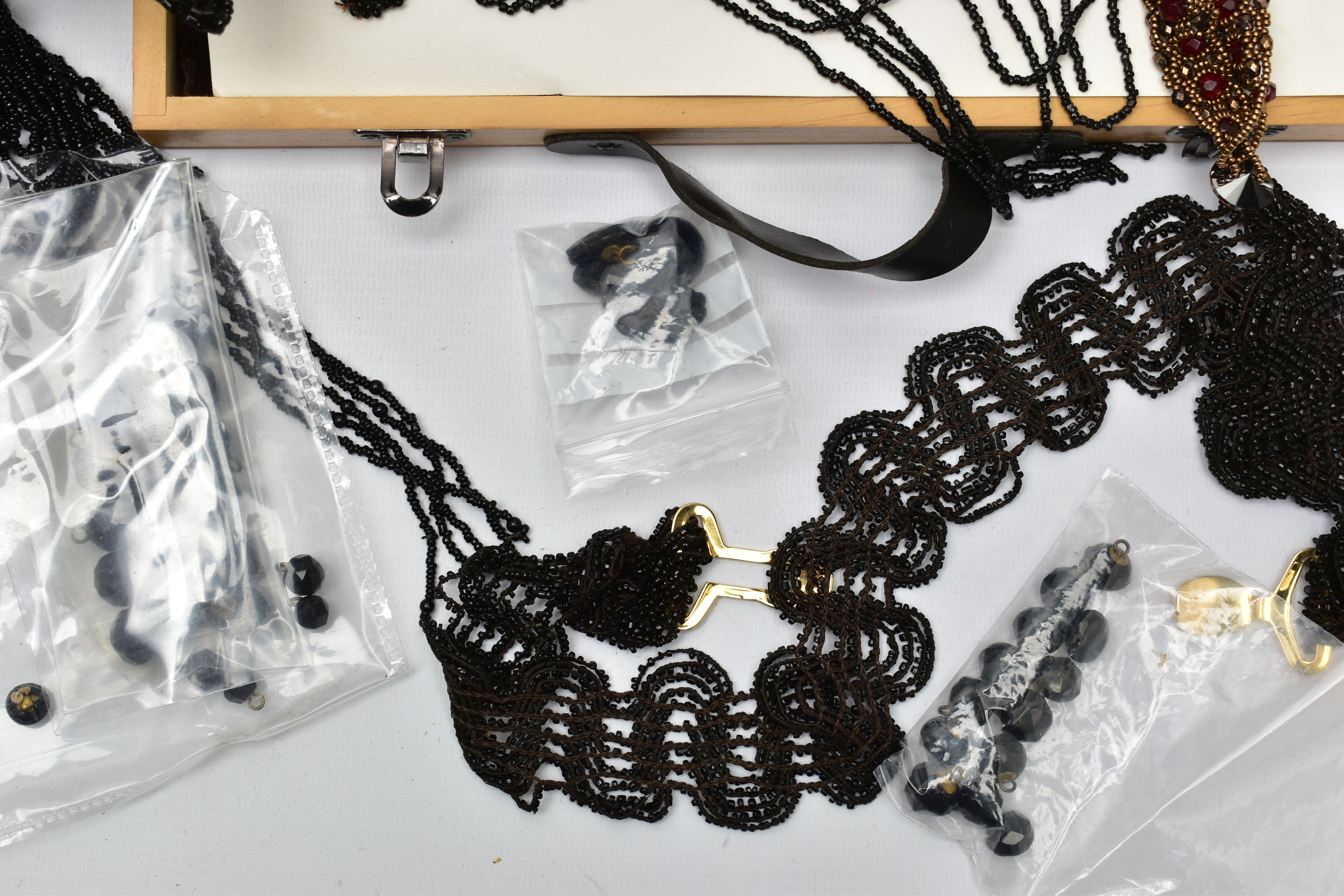 A BOX OF HABERDASHERY ACCESSORIES AND COSTUME JEWELLERY, to include a black beaded flapper girl head - Image 2 of 8