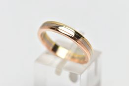 A CARTIER 'TRINITY' RING, designed as a yellow, white and rose plain polished band, signed and