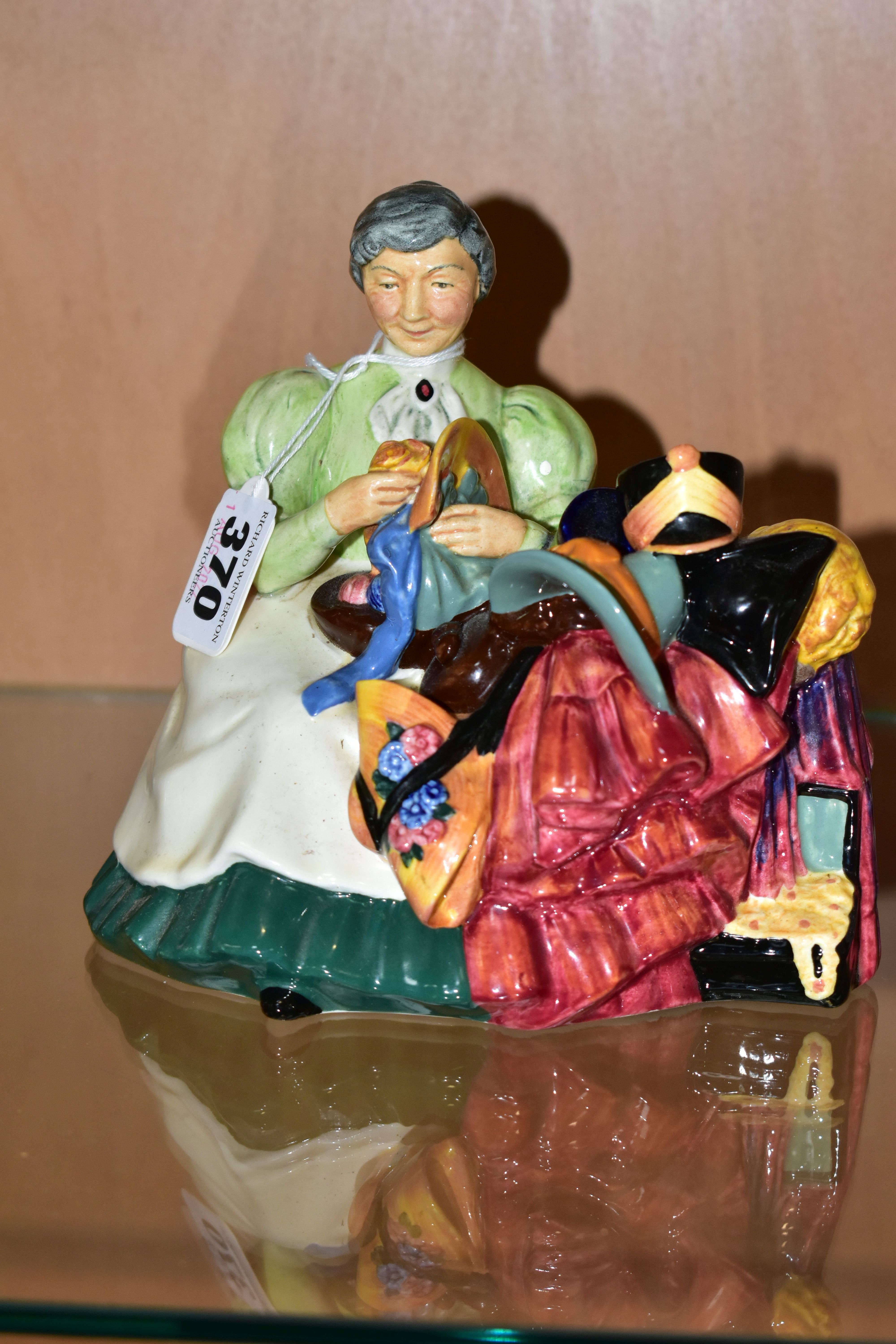 A ROYAL DOULTON FIGURE 'THE WARDROBE MISTRESS', HN2145 (Condition report: dusty but in good