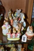 TWELVE BESWICK BEATRIX POTTER CHARACTER FIGURES, comprising 'Anna Maria', 'Flopsy, Mopsy and