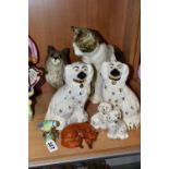 A WHINSTANLEY SEATED CAT AND SEVEN BESWICK BIRD AND ANIMAL FIGURES, the Winstanley cat with