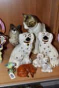 A WHINSTANLEY SEATED CAT AND SEVEN BESWICK BIRD AND ANIMAL FIGURES, the Winstanley cat with