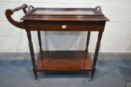 A MAHOGANY TWO TIER TEA TROLLEY, with removable drinks tray, two opposing drawers, barley twist
