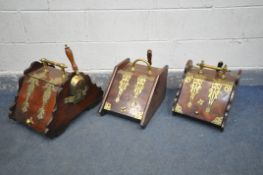 THREE 19TH CENTURY MAHOGANY AND BRASS COAL SCUTTLES, all with shovels (condition:-all good