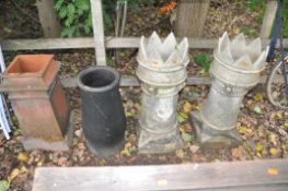 THREE VINTAGE CHIMNEY POTS including with castellated tops, and another black chimney, tallest