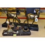 A FRENCH ART DECO STATUE OF TWO DEER TOGETHER WITH AN 'ART DECO' STYLE LAMP, the deer are on a black