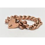 A ROSE GOLD CURB LINK BRACELET, hollow link bracelet, each link stamped '9c', fitted with a heart