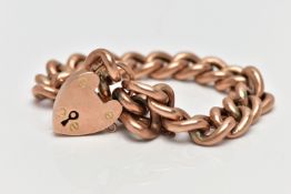 A ROSE GOLD CURB LINK BRACELET, hollow link bracelet, each link stamped '9c', fitted with a heart