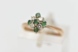 A 9CT GOLD EMERALD AND DIAMOND CLUSTER RING, diamond shape cluster set with four circular cut