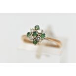 A 9CT GOLD EMERALD AND DIAMOND CLUSTER RING, diamond shape cluster set with four circular cut