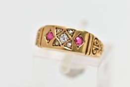 A LATE VICTORIAN 18CT GOLD, RUBY AND DIAMOND RING, the centre of the ring is set with a single