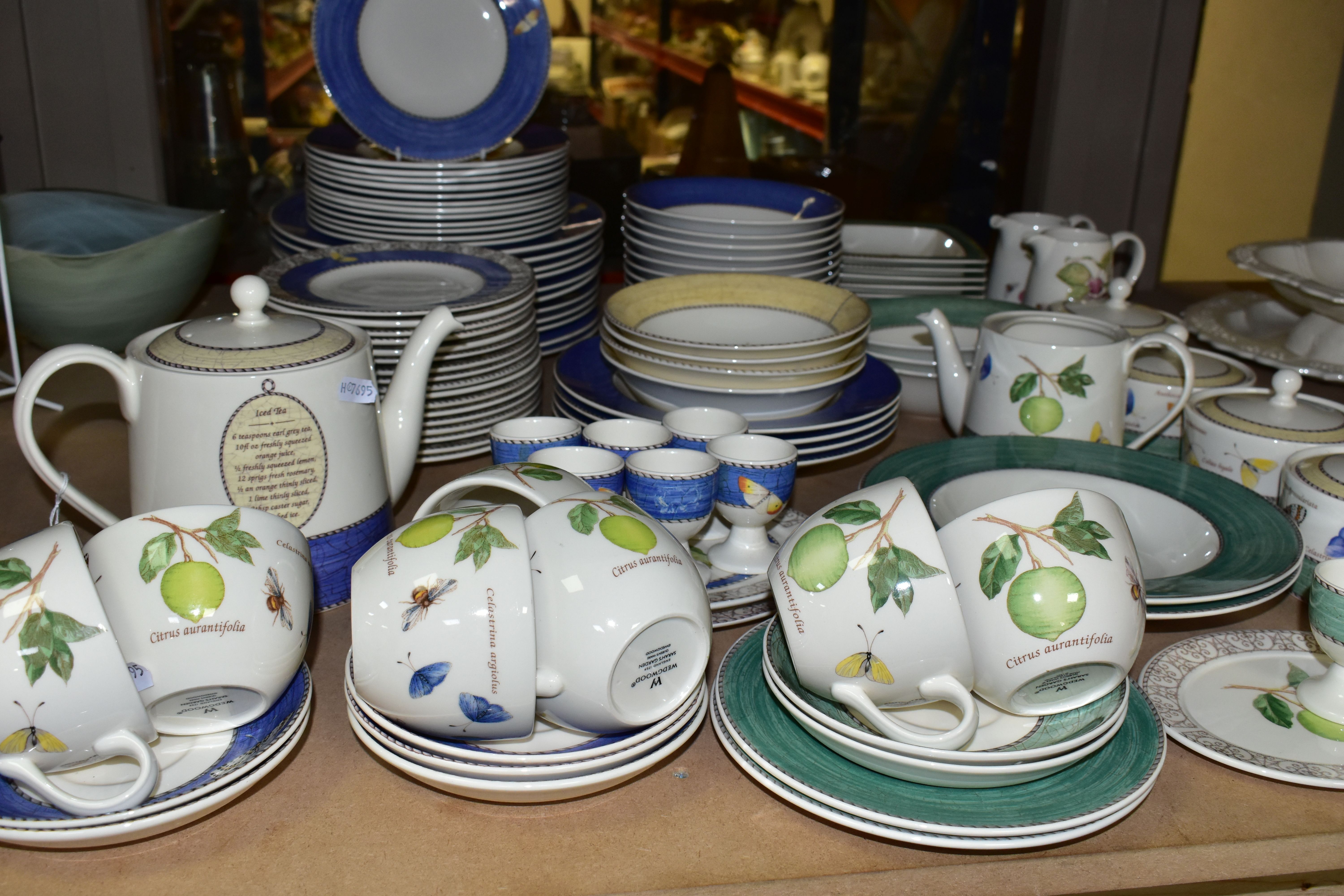 A ONE HUNDRED AND SEVEN PIECE WEDGWOOD SARAH'S GARDEN DINNER SERVICE, with blue border unless