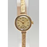 A LADIES 9CT GOLD WRISTWATCH WITH CHARM, hand wound movement, round discoloured dial signed 'Limit',