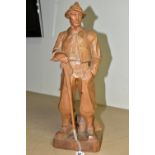 A HAND CARVED PINE WOOD FIGURE, of a mountain climber, 'Paul Émile Caron' style, height 42cm (1) (