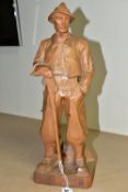 A HAND CARVED PINE WOOD FIGURE, of a mountain climber, 'Paul Émile Caron' style, height 42cm (1) (