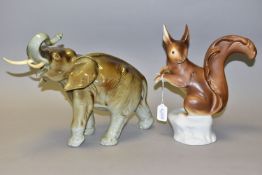 A ROYAL DUX RED SQUIRREL AND A ROYAL DUX ELEPHANT, model no's. 389 and 378/ III respectively, the