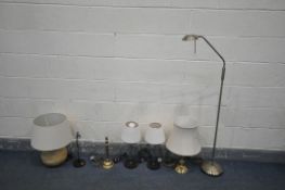 A SELECTION OF LIGHTING, to include two brass table lamps, an adjustable floor lamp, and four